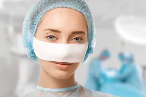 Bandage fixed on nose during rehabilitation after rhinoplasty